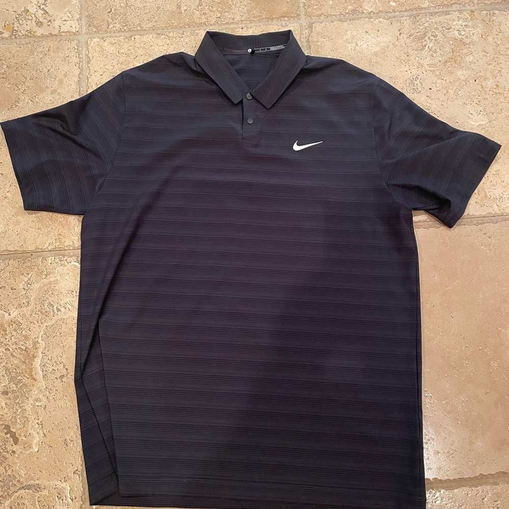 Size L, Tiger Woods collection polo. Worn once. Like-new condition.